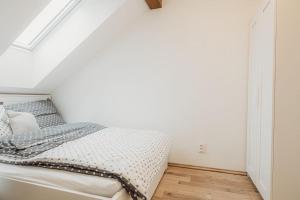 Posteľ alebo postele v izbe v ubytovaní Vinný sklep Rozárka