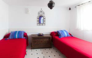 Ένα ή περισσότερα κρεβάτια σε δωμάτιο στο La Estrella de Tarifa