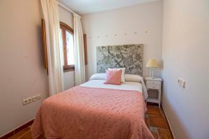 Posteľ alebo postele v izbe v ubytovaní Ático San Juan, Apartamentos Living Sur
