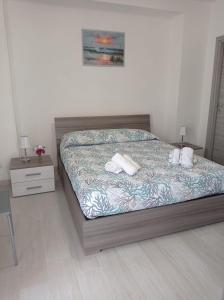Llit o llits en una habitació de Spiaggia LazzarettoHouse