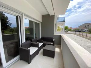 A balcony or terrace at Apartman Emanuel
