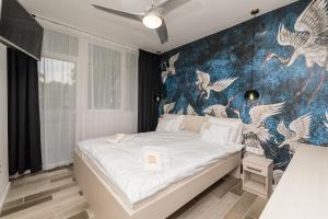 Postel nebo postele na pokoji v ubytování Balinn rooms