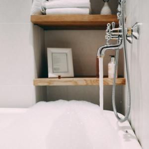 Postel nebo postele na pokoji v ubytování Hotel Onni
