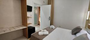 Postel nebo postele na pokoji v ubytování IL GIGLIO B&B