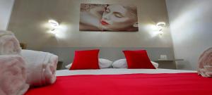 Postel nebo postele na pokoji v ubytování IL GIGLIO B&B