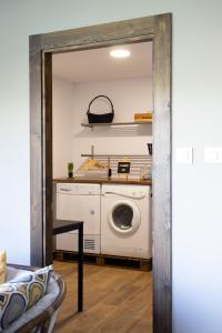 A kitchen or kitchenette at Casa Maia