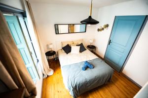 Postel nebo postele na pokoji v ubytování Duplex Typique Centre Bayonne + 29 fotografií