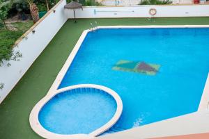 Basen w obiekcie Ático con terraza-solárium y piscina 4-6 personas WIFI A/C lub w pobliżu