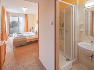 Koupelna v ubytování Szent János Hotel