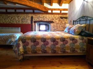 Llit o llits en una habitació de Don Baldomero Hotel Rural