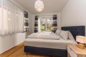 Posteľ alebo postele v izbe v ubytovaní Appartement Alpengefühl am Dachstein