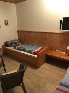 Postel nebo postele na pokoji v ubytování Pension am Eichenhain
