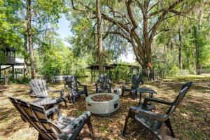 a group of chairs sitting around a fire pit at S'more Fun in Middleburg