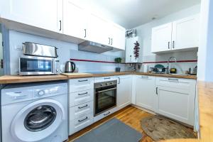 Kuchyň nebo kuchyňský kout v ubytování Duplex Typique Centre Bayonne