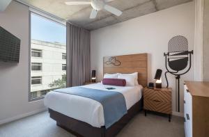 Postel nebo postele na pokoji v ubytování Club Wyndham Austin