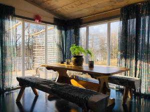 Gallery image of Liljekonvalj Cottage overlooking the river sauna in Avesta