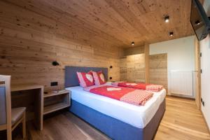 Posteľ alebo postele v izbe v ubytovaní Agriturismo Lüch de Vanc