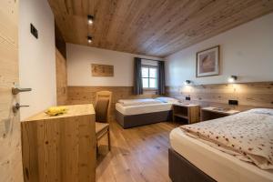 Posteľ alebo postele v izbe v ubytovaní Agriturismo Lüch de Vanc