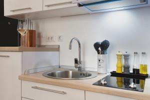 Nhà bếp/bếp nhỏ tại Emi Luxury Apartments +34 ảnh