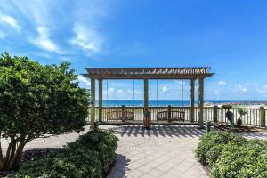a pavilion at the beach with the ocean in the background at Bristol 205 - Beachfront Condo with Breathtaking Views in Gulf Shores