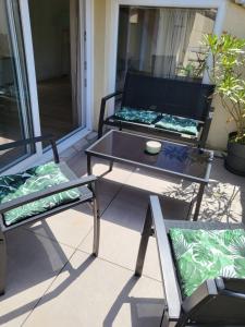 Area soggiorno di La Dolce Vita Nîmoise Terrasse 100 m des Arènes