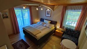 Katil atau katil-katil dalam bilik di Ferienparadies Gutounik