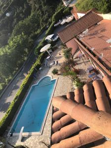 Výhled na bazén z ubytování casa vacanze deluxe nebo okolí