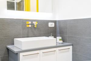 Ett badrum på Colours Apartments & Rooms