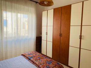 Postel nebo postele na pokoji v ubytování NoiSalento