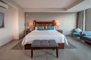 En eller flere senger på et rom på Gran Hotel Concordia San Luis Potosi