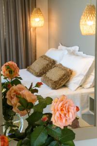 A bed or beds in a room at Beachfront Villa Phi φ