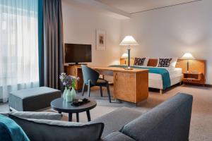 Rúm í herbergi á Dorint Hotel Dresden
