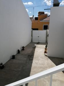 a view of a patio from the back of a house at Alojamento Justo - vila de Montargil in Montargil