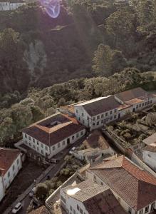 an overhead view of a city with buildings and trees at Brumas Ouro Preto Hostel e Pousada in Ouro Preto