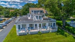 an aerial view of a large white house at The Sparhawk Oceanfront Resort in Ogunquit