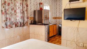 Kuchyňa alebo kuchynka v ubytovaní Solar Maresias Flats