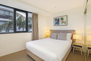 Ένα ή περισσότερα κρεβάτια σε δωμάτιο στο Breeze Mooloolaba, Ascend Hotel Collection