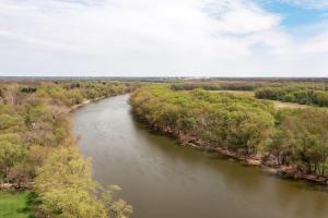 an aerial view of a river with trees at SAND HILL COTTAGE 3 Bedroom Home near PURDUE! River & Park View in West Lafayette