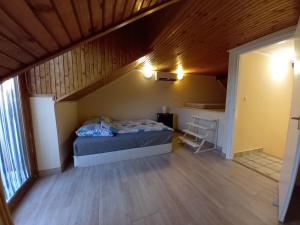 Posteľ alebo postele v izbe v ubytovaní MALIBU APARTMENT BALATON NORTH