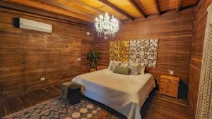 Een bed of bedden in een kamer bij Hotel Agualinda Doradal