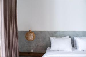 Letto o letti in una camera di Molokai Suites