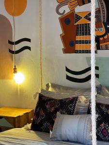 Postel nebo postele na pokoji v ubytování 13 Cielos Hostel & Coworking