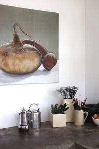 a painting of a large brown object on a table at THE BEACH HAVENS - Haven Oceana in Emerald Beach