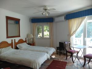 A bed or beds in a room at Finca Batan
