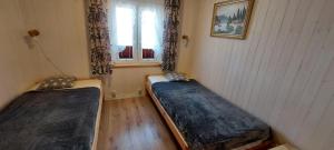 Postel nebo postele na pokoji v ubytování Home Bjornbyn 130