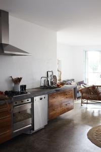 a kitchen with a stove and a counter top at THE BEACH HAVENS - Haven Tropicana in Emerald Beach