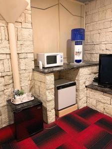 Virtuvė arba virtuvėlė apgyvendinimo įstaigoje premium resort nagoya