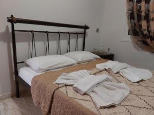 Postel nebo postele na pokoji v ubytování Alexandra