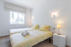 A bed or beds in a room at Casa Viviana
