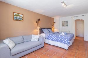 A bed or beds in a room at Casa Viviana